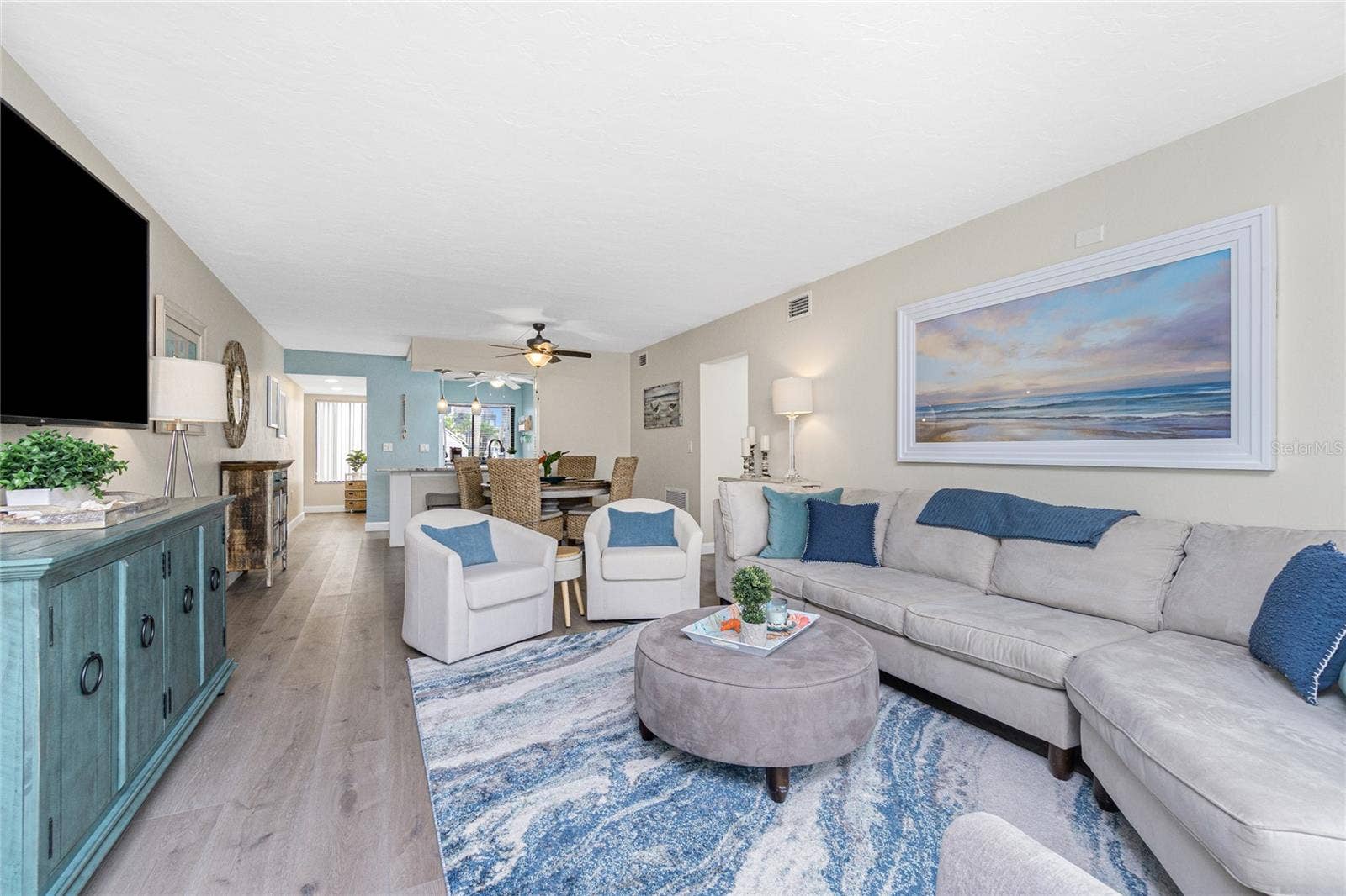 2955 N BEACH ROAD, #A411, Englewood, FL 34223 Living Room Looking Back to Dining Area