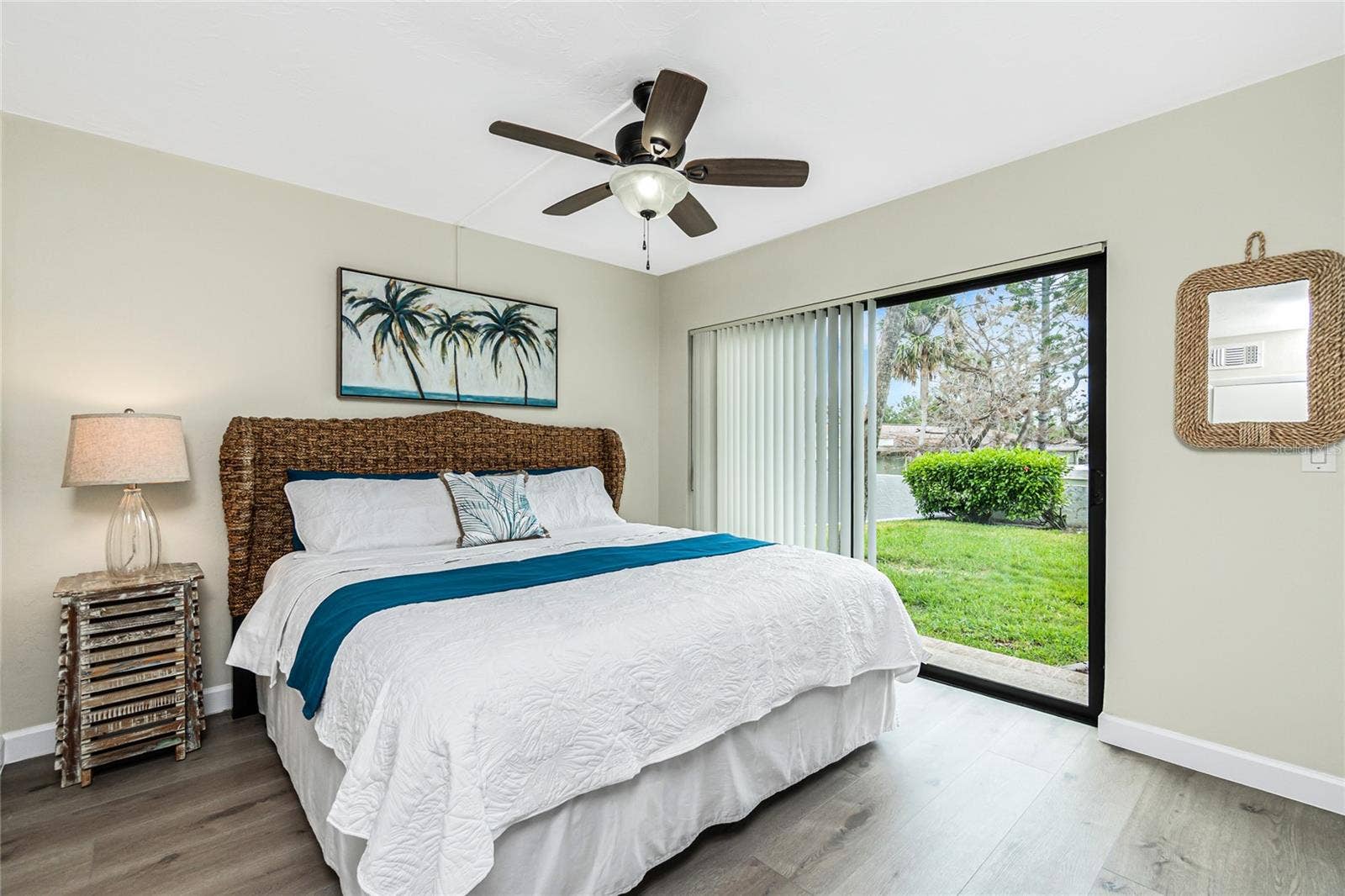 2955 N BEACH ROAD, #A411, Englewood, FL 34223 Guest Bedroom with Slider Looking Out