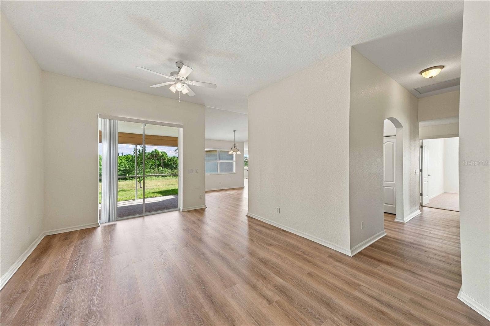 Living area with sliding glass doors to the lanai