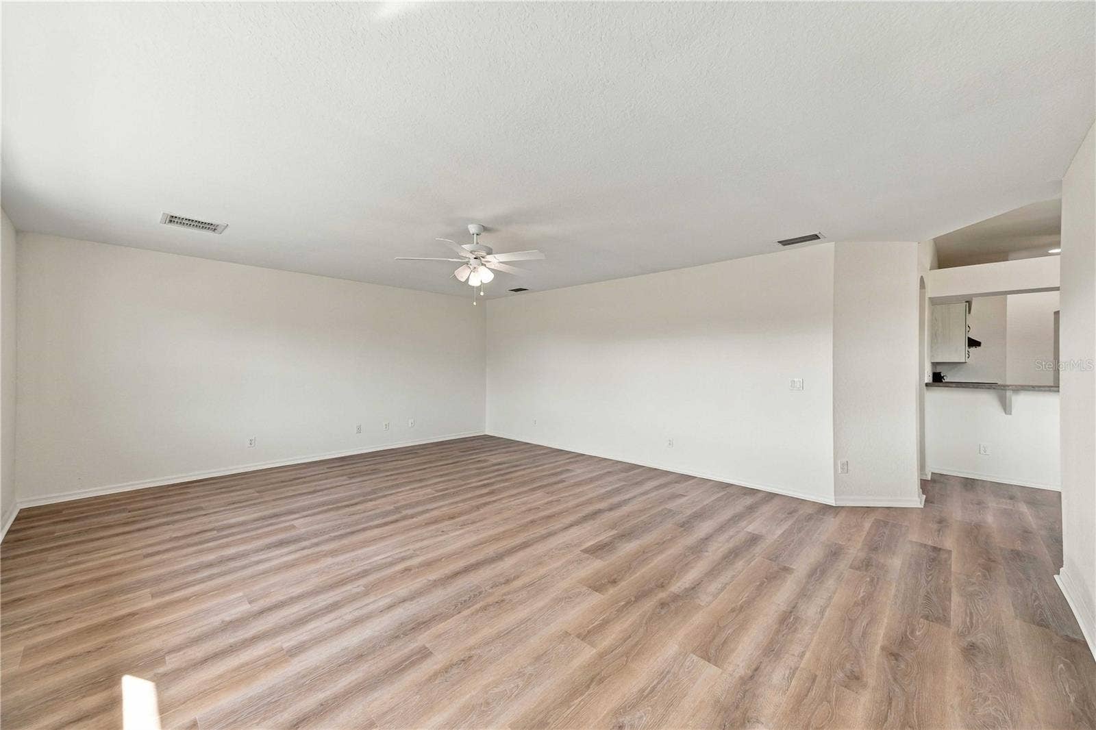 Family room with open flow to the rest of the home