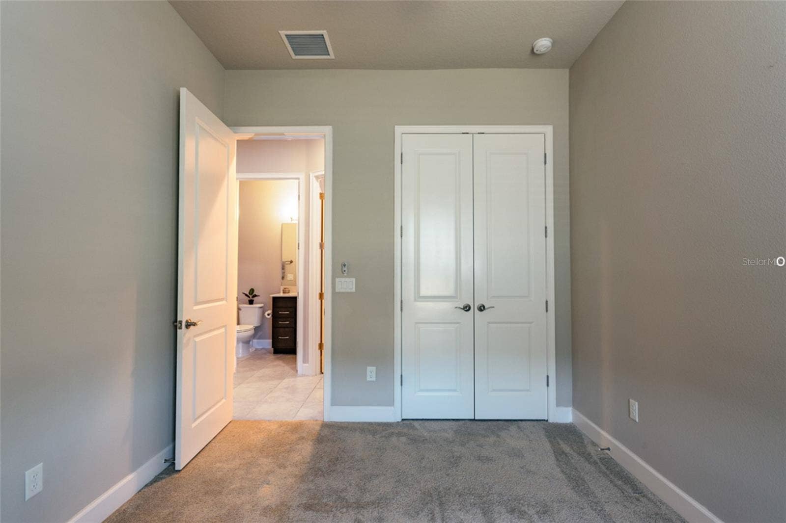 3 NEWHAVEN LANE, Ormond Beach, FL 32174 Secondary bedroom at opposite end of the home ensures privacy for guests