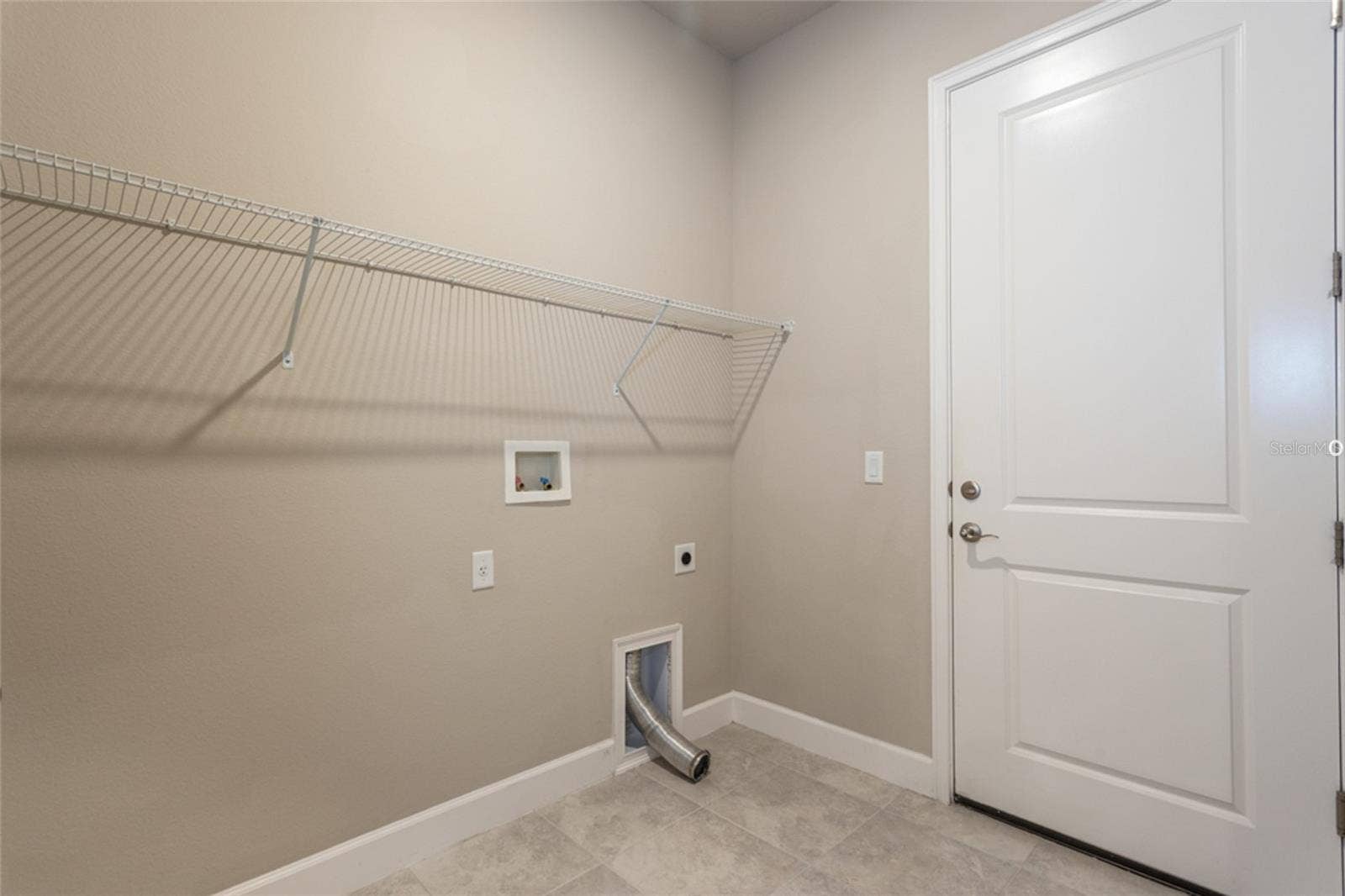 3 NEWHAVEN LANE, Ormond Beach, FL 32174 Laundry area has room for washer, dryer and storage