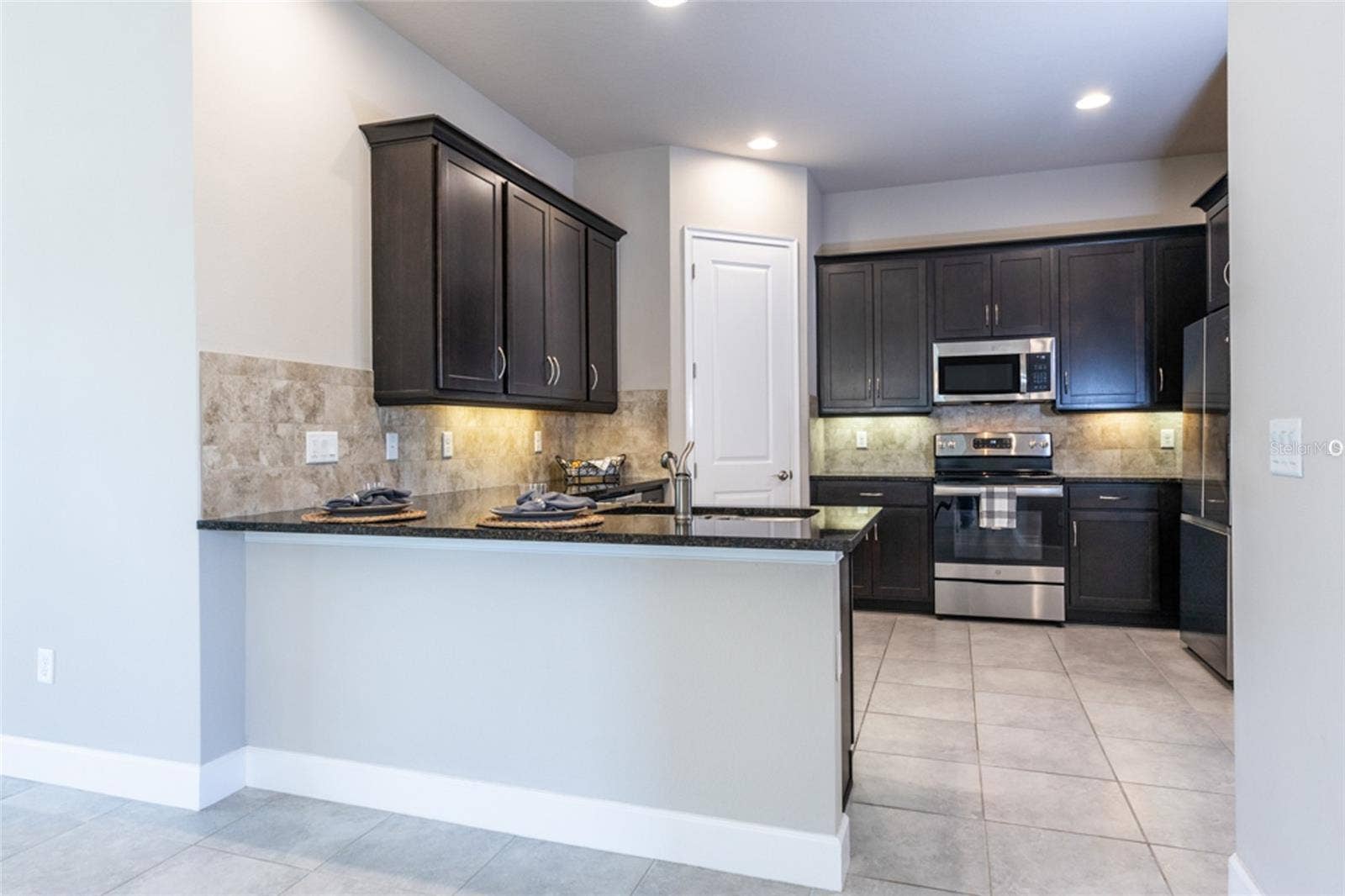 3 NEWHAVEN LANE, Ormond Beach, FL 32174 Pull up a chair and enjoy