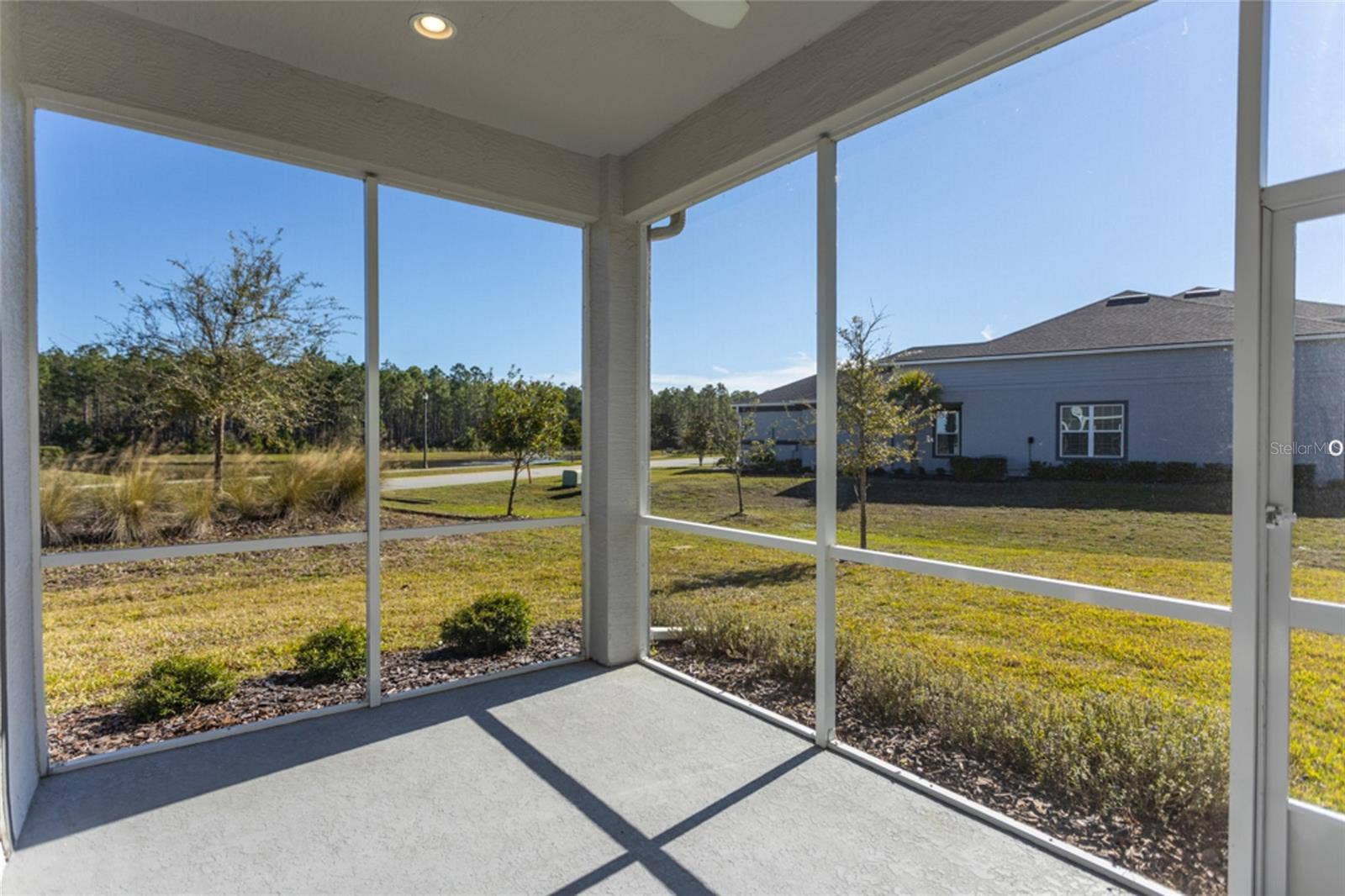 3 NEWHAVEN LANE, Ormond Beach, FL 32174 Have your morning coffee here - plenty of room for table & chairs