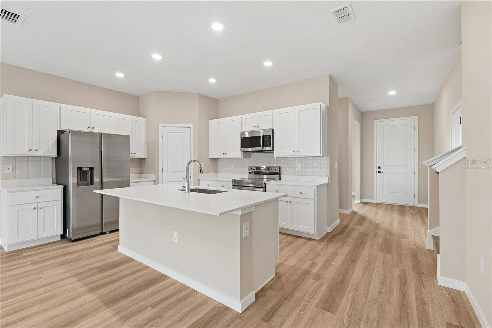 Images are of a similar model; actual home may vary