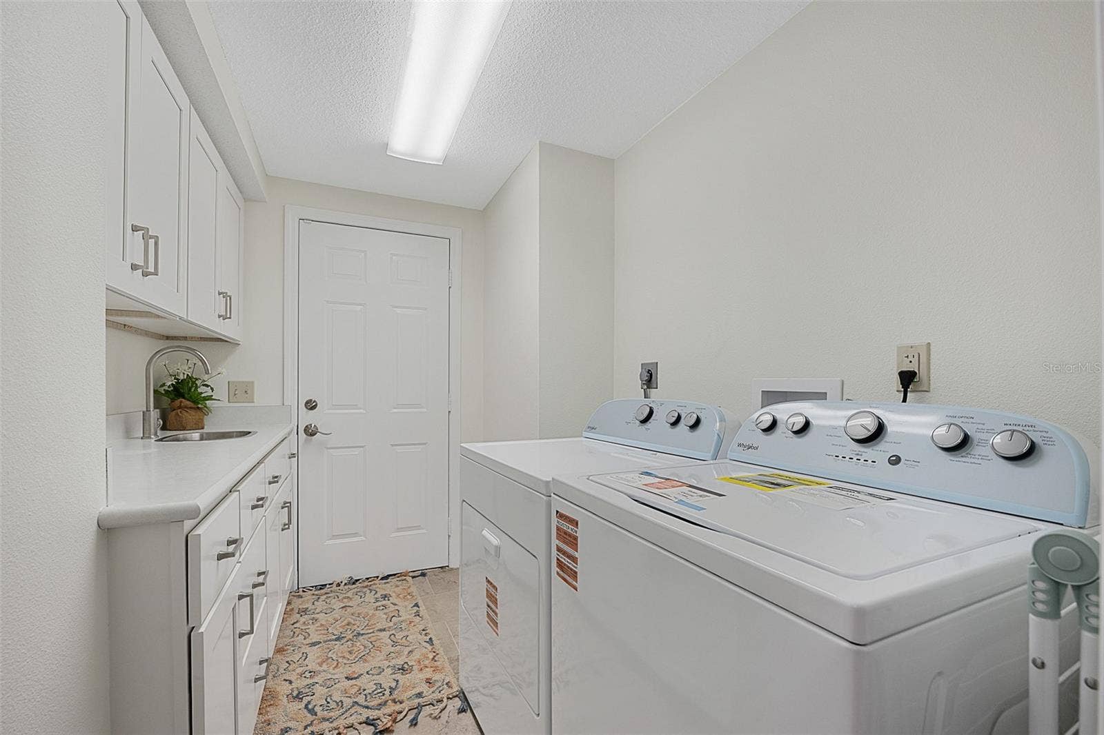 1 CROOKED BRIDGE WAY, Ormond Beach, FL 32174 Laundry room with brand new W/D and cabinets