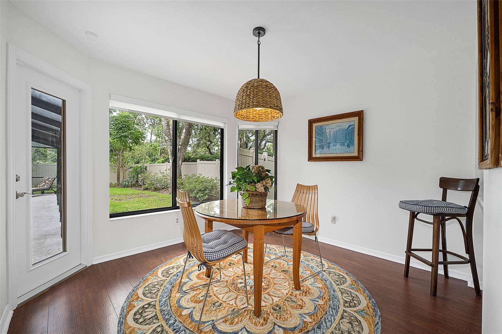 1 CROOKED BRIDGE WAY, Ormond Beach, FL 32174 Breakfast nook with door to lanai