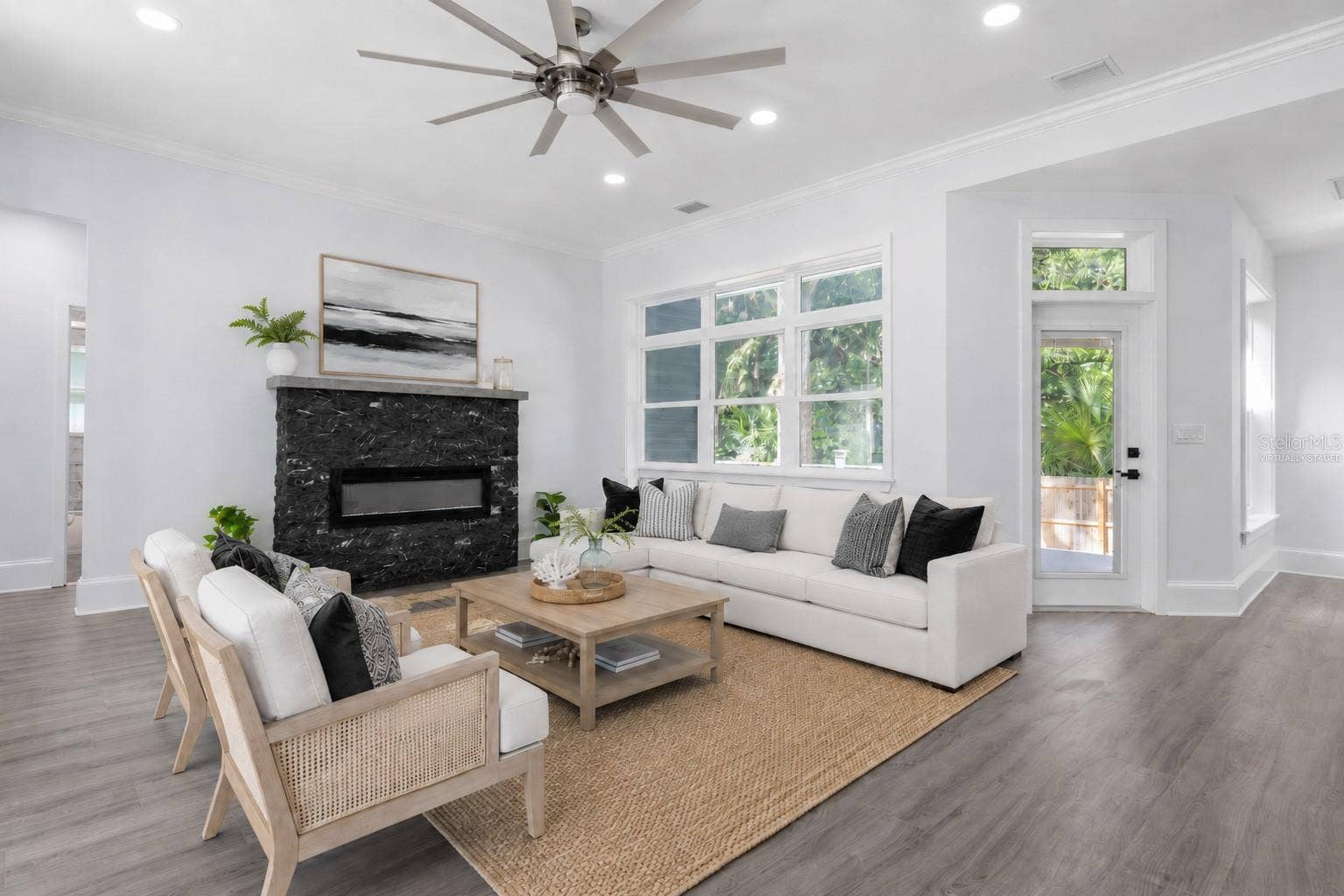 117 HERNANDEZ AVENUE, Palm Coast, FL 32137 Living Room - virtually staged