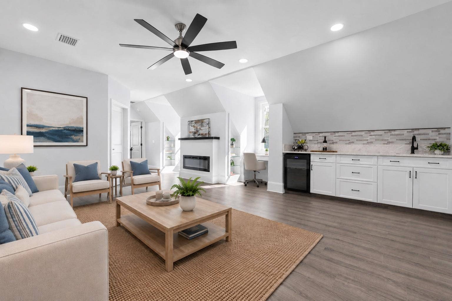 117 HERNANDEZ AVENUE, Palm Coast, FL 32137 Upstairs LR - virtually staged