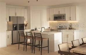 PHOTOS OF SAME MODEL WITH SIMILIAR FINISHES.  Virtually Staged.