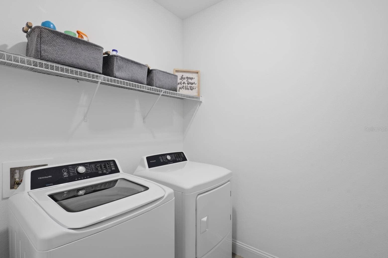 2110 RAGLAN CIRCLE, Ormond Beach, FL 32174 Laundry room features a washer & dryer that are staying with this home.