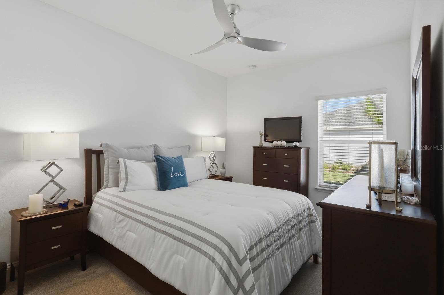 2110 RAGLAN CIRCLE, Ormond Beach, FL 32174 The spacious third bedroom holds another large set of furniture with a bypass door closet.