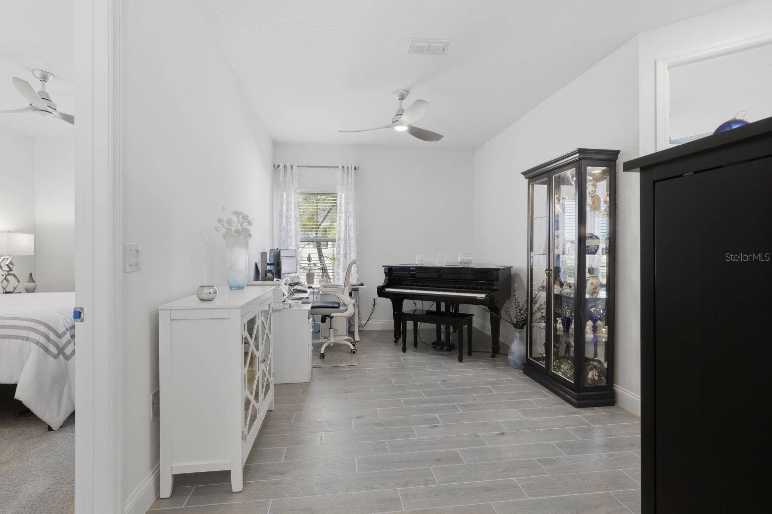 2110 RAGLAN CIRCLE, Ormond Beach, FL 32174 The Flex Space between Bedrooms 2 & 3 currently house a baby grand piano and an office space.