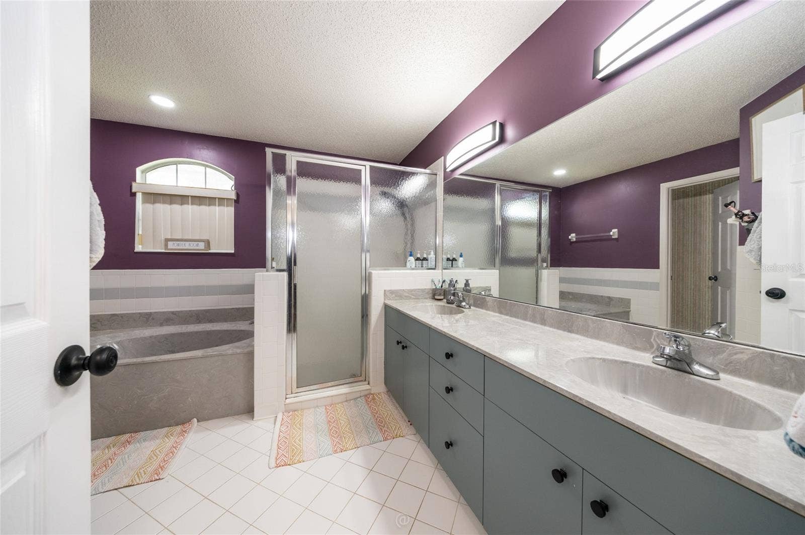 5 FAIRFAX COURT, Palm Coast, FL 32164 Owners suite bathroom with tub and shower