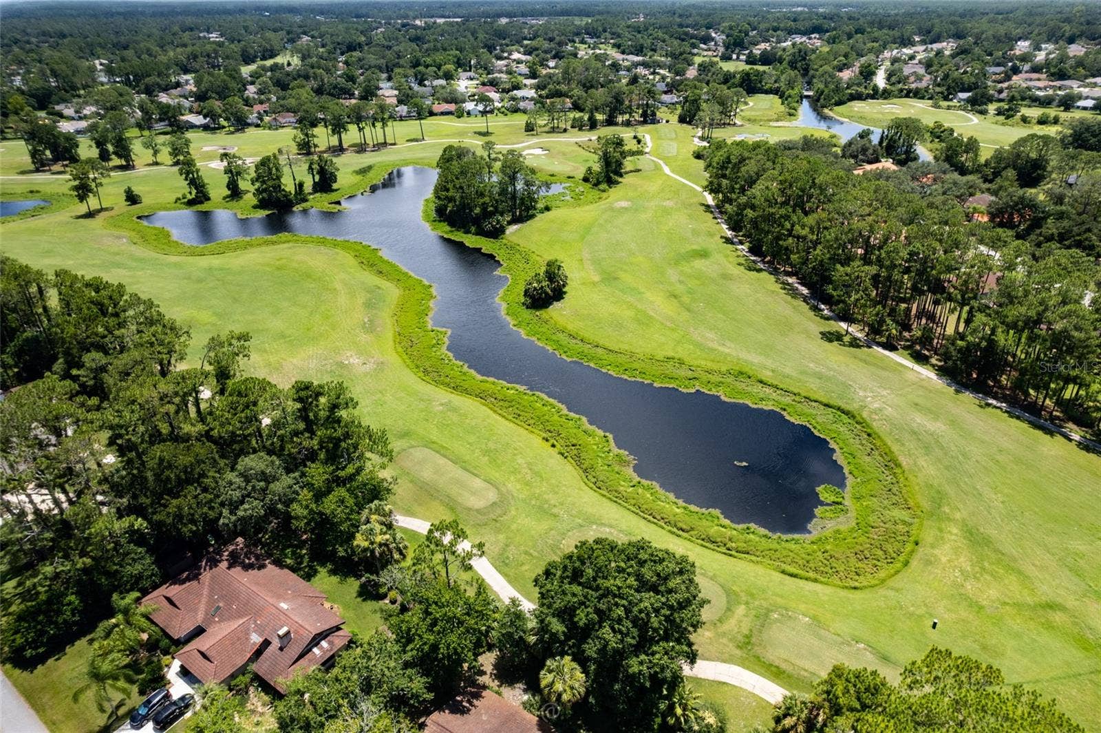 5 FAIRFAX COURT, Palm Coast, FL 32164 5 minutes to Pine Lakes Golf Course