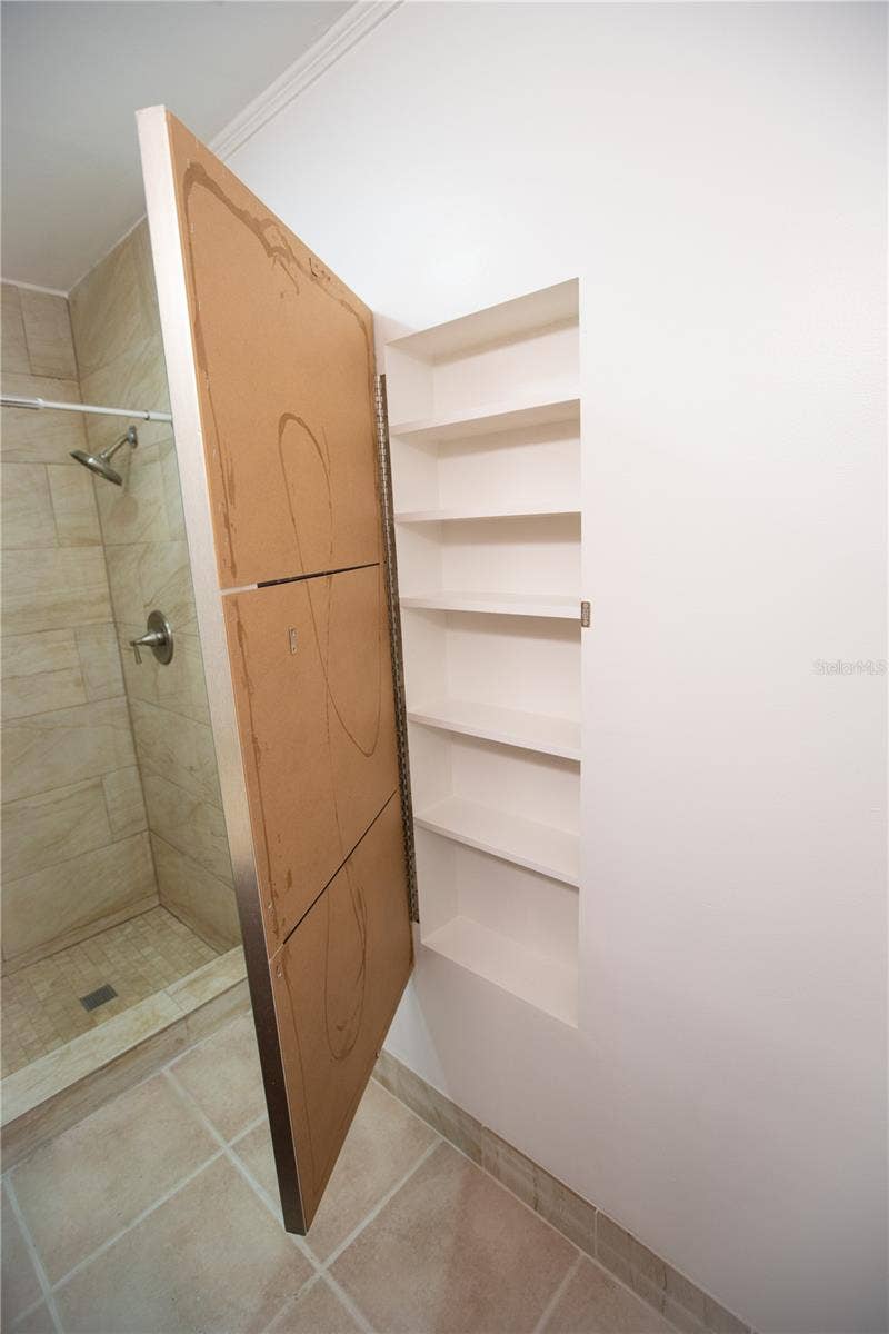 Master Bathroom Mirror hidden cabinet