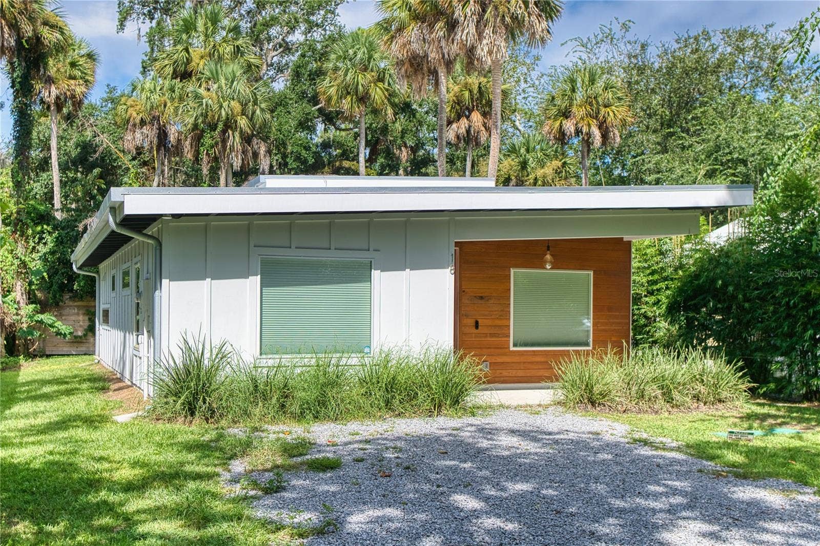 18 SANCHEZ AVENUE, Palm Coast, FL 32137 Welcome to 18 Sanchez Avemodern coastal style framed by mature trees.