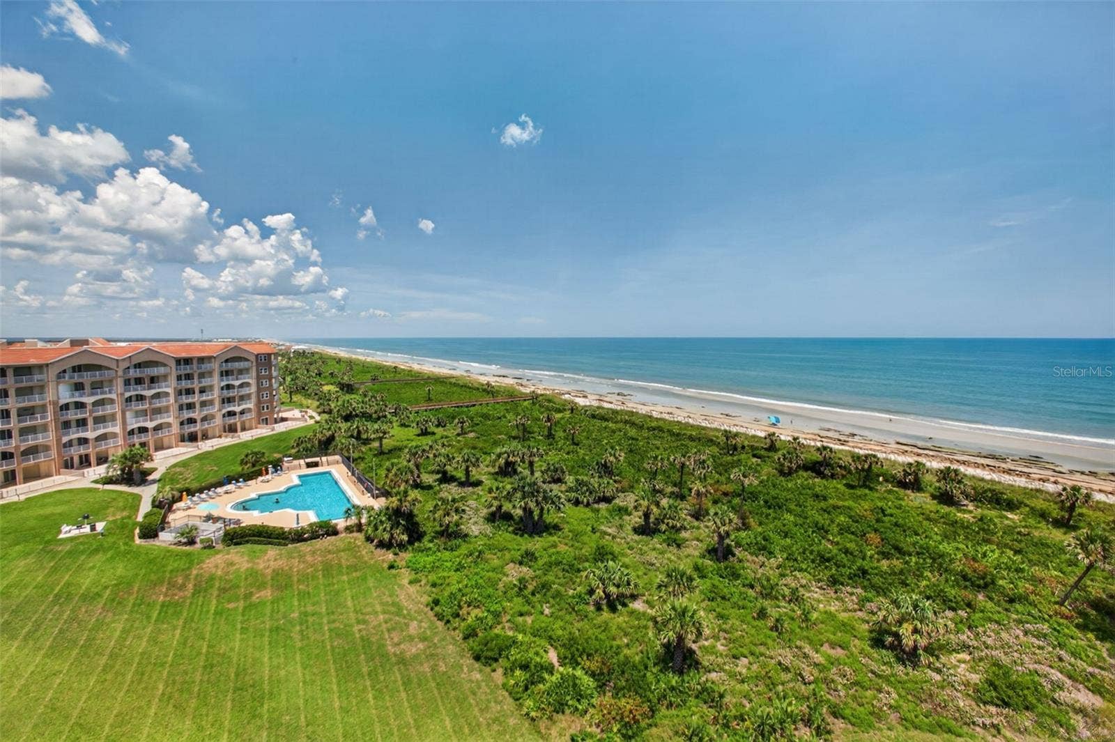 80 SURFVIEW DRIVE, #809, Palm Coast, FL 32137 Back of building/pool