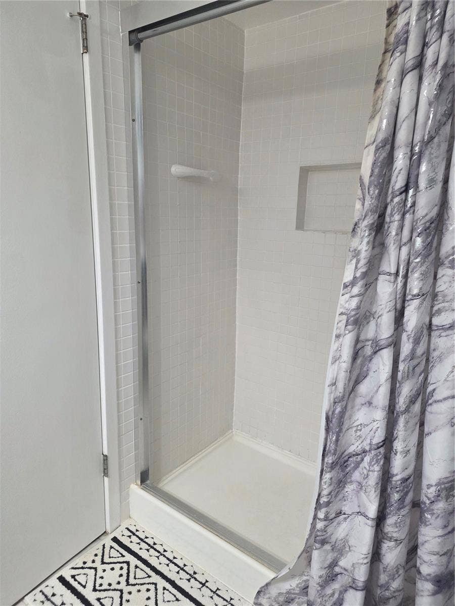 60 CLUB HOUSE DRIVE, #208, Palm Coast, FL 32137 Primary walk-in shower