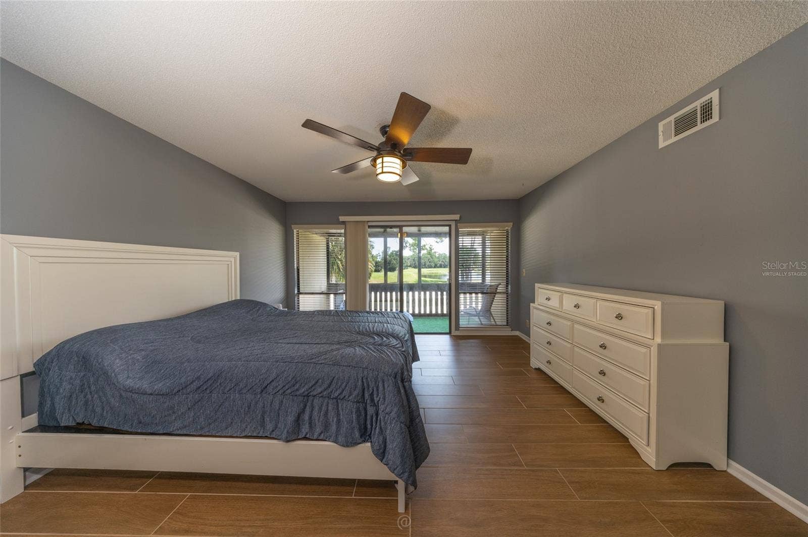 60 CLUB HOUSE DRIVE, #208, Palm Coast, FL 32137 Virtually staged Primary Suite