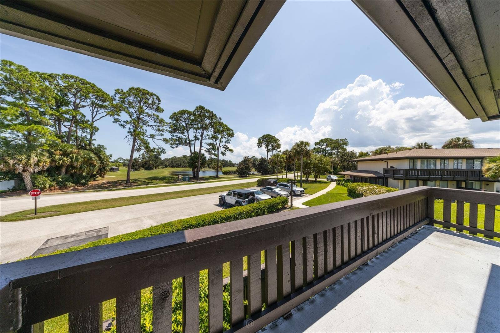 60 CLUB HOUSE DRIVE, #208, Palm Coast, FL 32137 Balcony-corner view