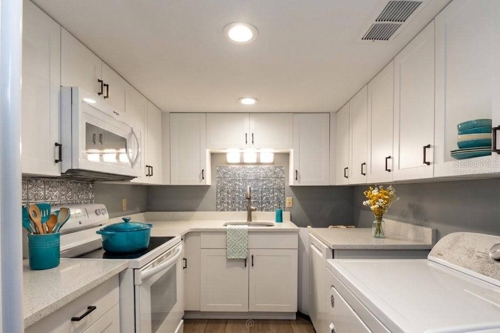 60 CLUB HOUSE DRIVE, #208, Palm Coast, FL 32137 Virtually staged