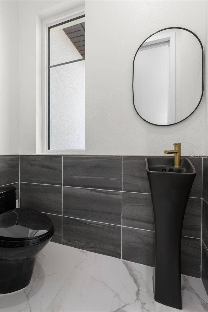 116 LONGVIEW WAY N, Palm Coast, FL 32137 TOTO Polished TOILETS