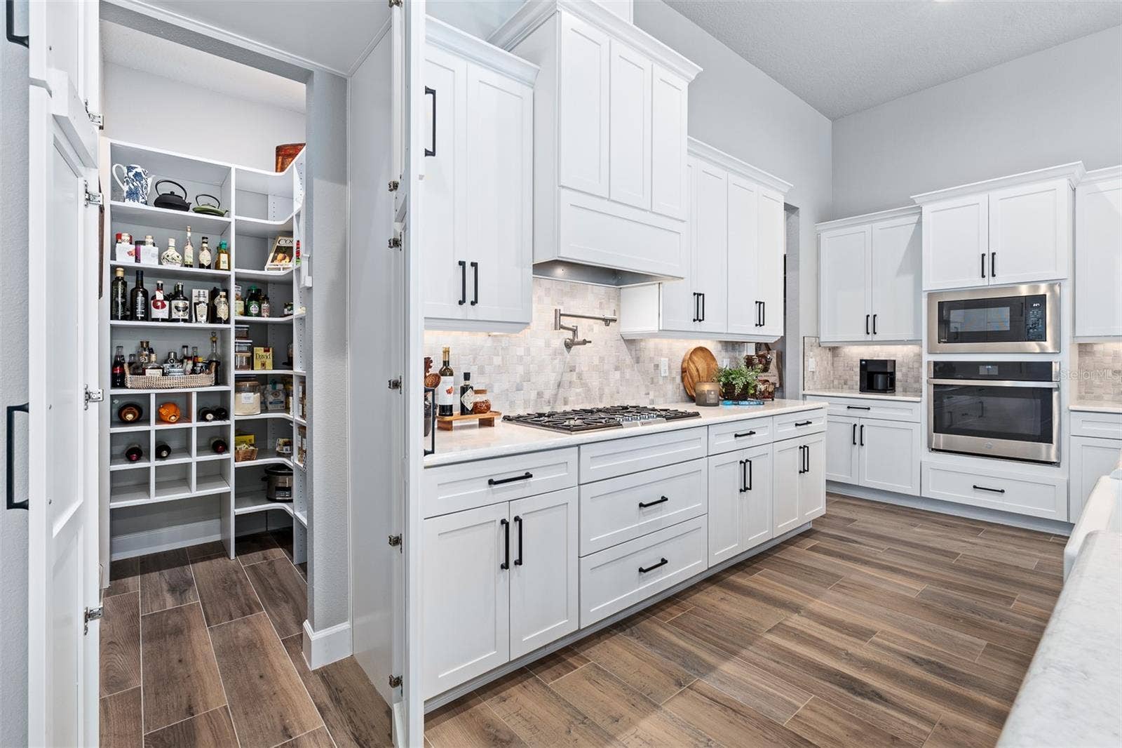 463 STIRLING BRIDGE DRIVE, Ormond Beach, FL 32174 Kitchen & Hidden Pantry