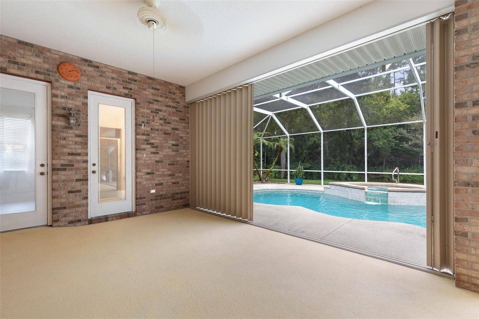 47 CAMBRIDGE TRACE, Ormond Beach, FL 32174 Storm shutters for Lanai