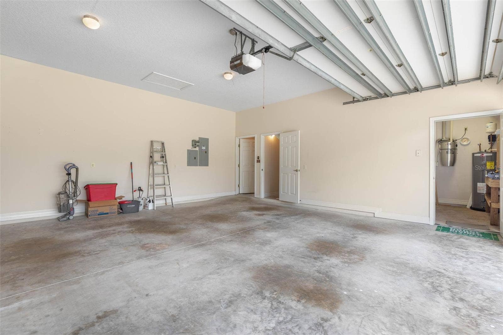 47 CAMBRIDGE TRACE, Ormond Beach, FL 32174 Oversized Garage with Workshop and Storage