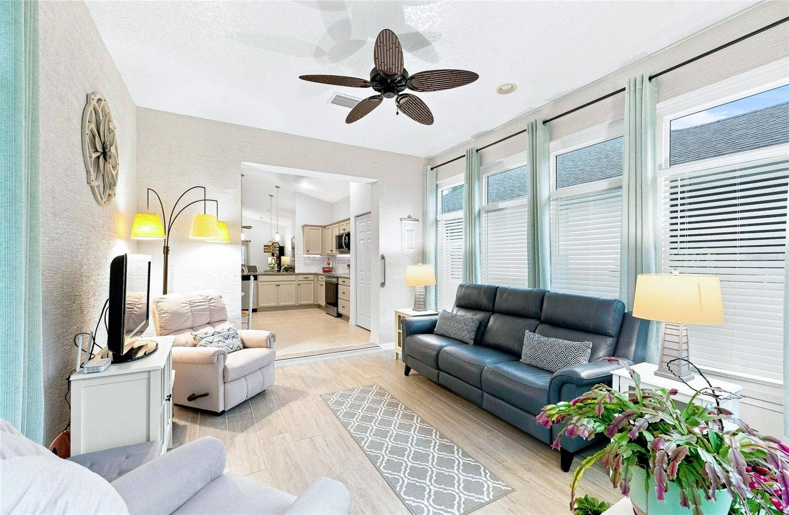Your new favorite room! This heated and air-conditioned Florida room offers comfortable, year-round living space for relaxing, entertaining or enjoying the sunshinewithout the heat