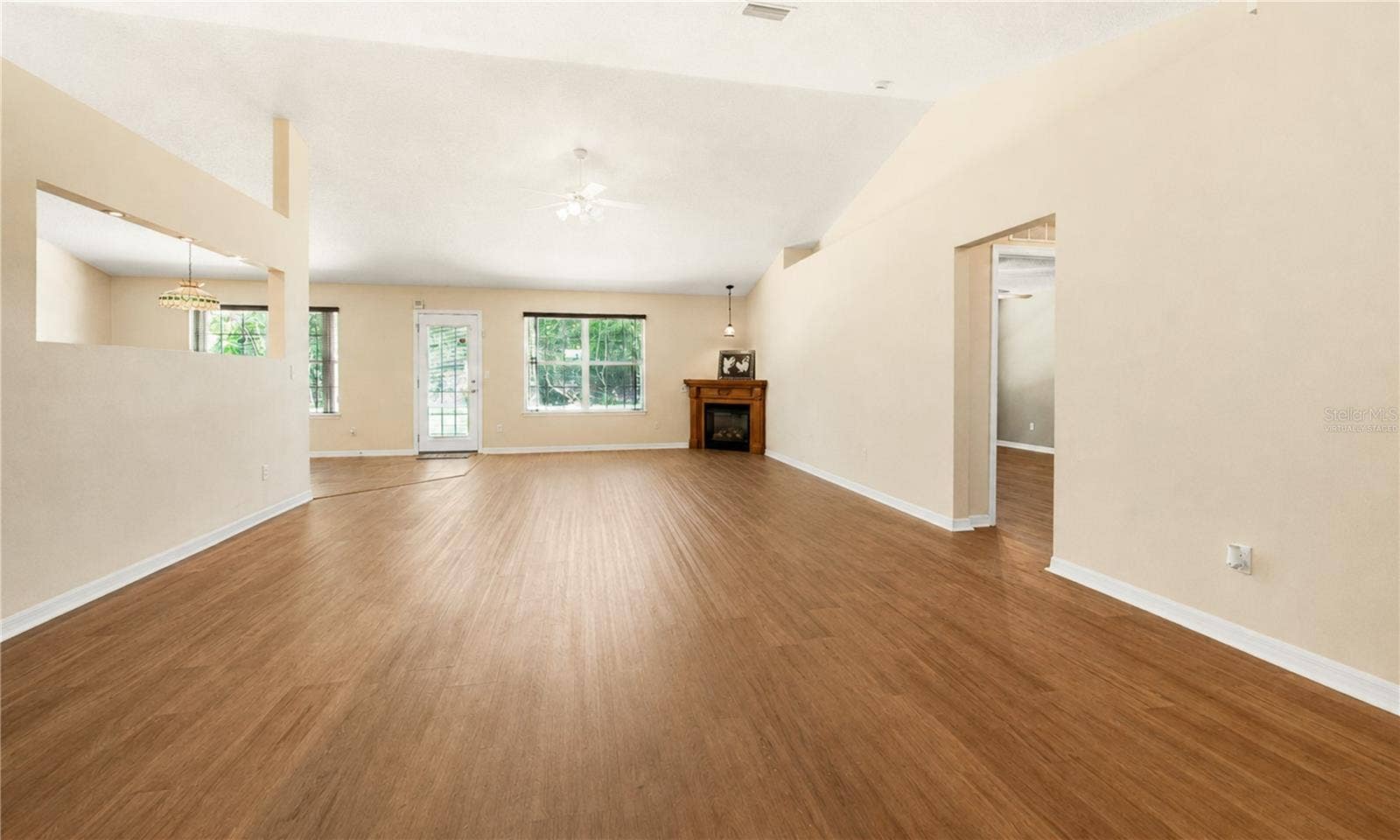 38 PRINCESS ROSE DRIVE, Palm Coast, FL 32164 Virtually Staged Front Entrance View to Great Room without Light and Pool Table
