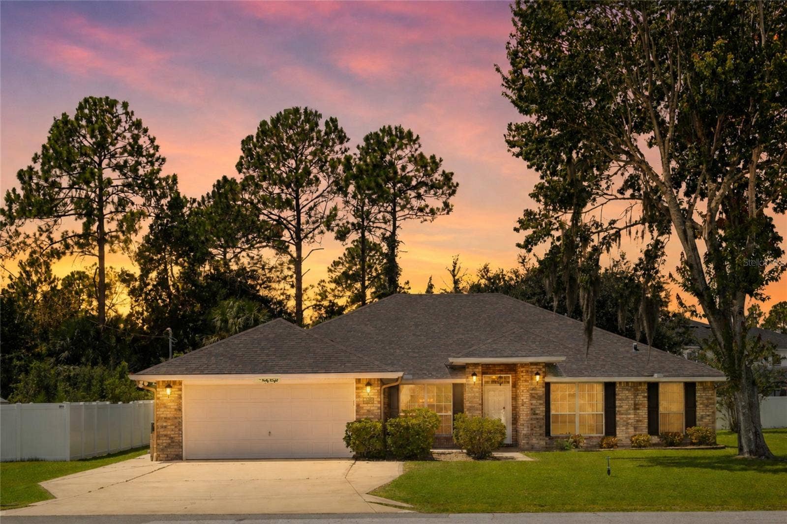38 PRINCESS ROSE DRIVE, Palm Coast, FL 32164 Evening View of the Exterior of the Home