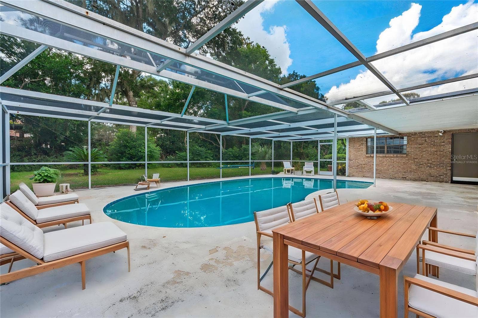 82 S ST ANDREWS DRIVE, Ormond Beach, FL 32174 Virtually Staged- Spacious & Inviting Pool & Deck