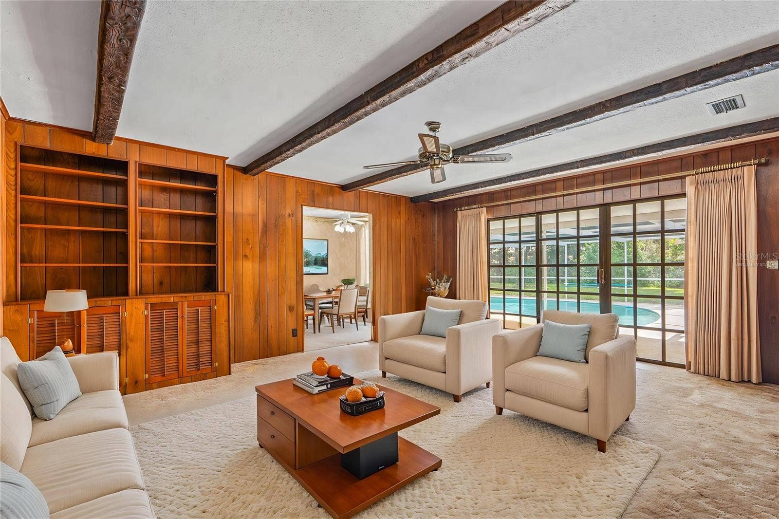82 S ST ANDREWS DRIVE, Ormond Beach, FL 32174 Virtually Staged- Family Room Overlooking Pool