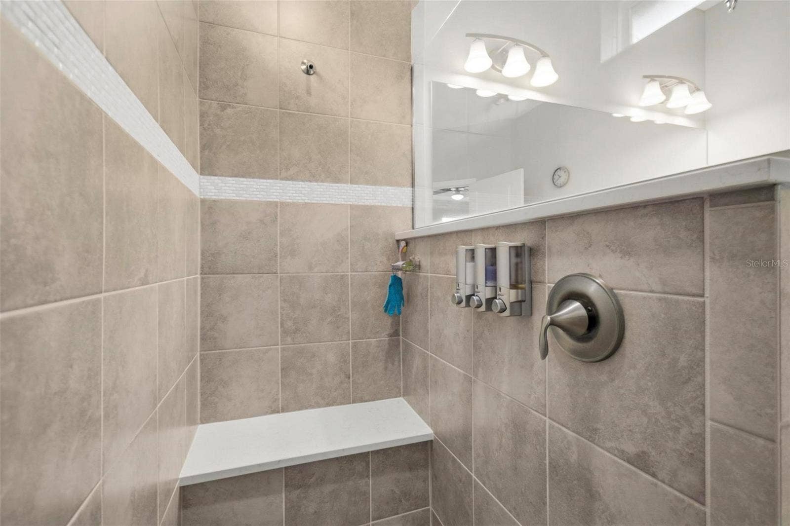 7 TIDEWAY TRAIL, Palm Coast, FL 32137 Primary shower built in seat