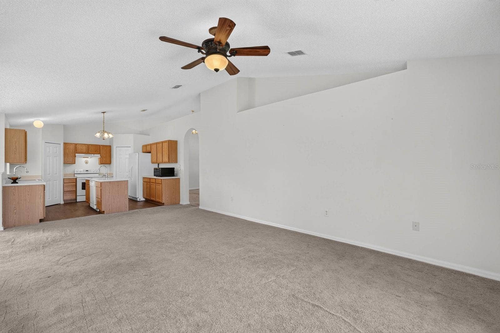 99 PICKERING DRIVE, Palm Coast, FL 32164 Family Room looking towards the kitchen