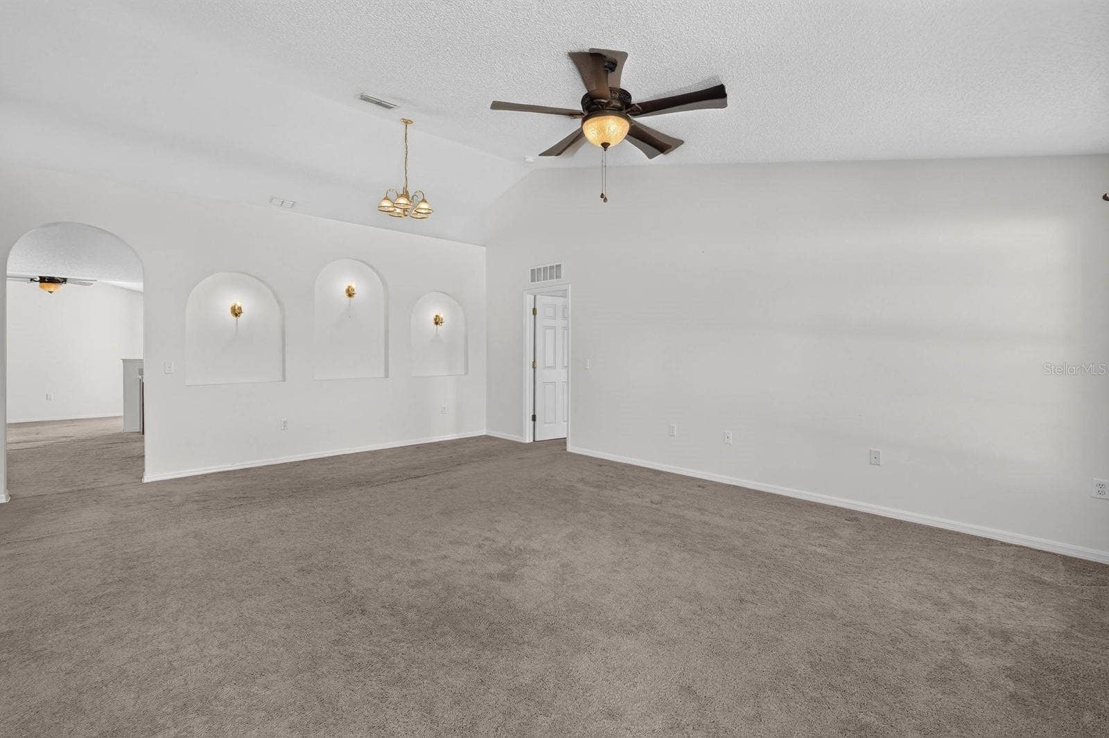 99 PICKERING DRIVE, Palm Coast, FL 32164 Front Living room/dining room