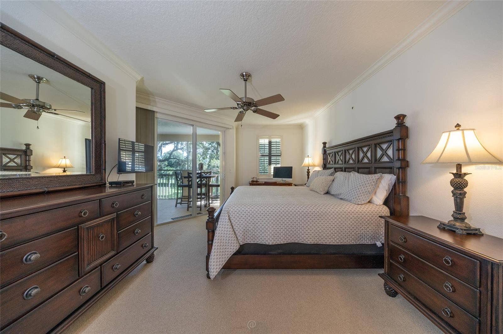 115 RIVERVIEW BEND S, #2123, Palm Coast, FL 32137 PRIMARY BEDROOM WITH A VIEW AND SLIDER OPENS TO THE PATIO