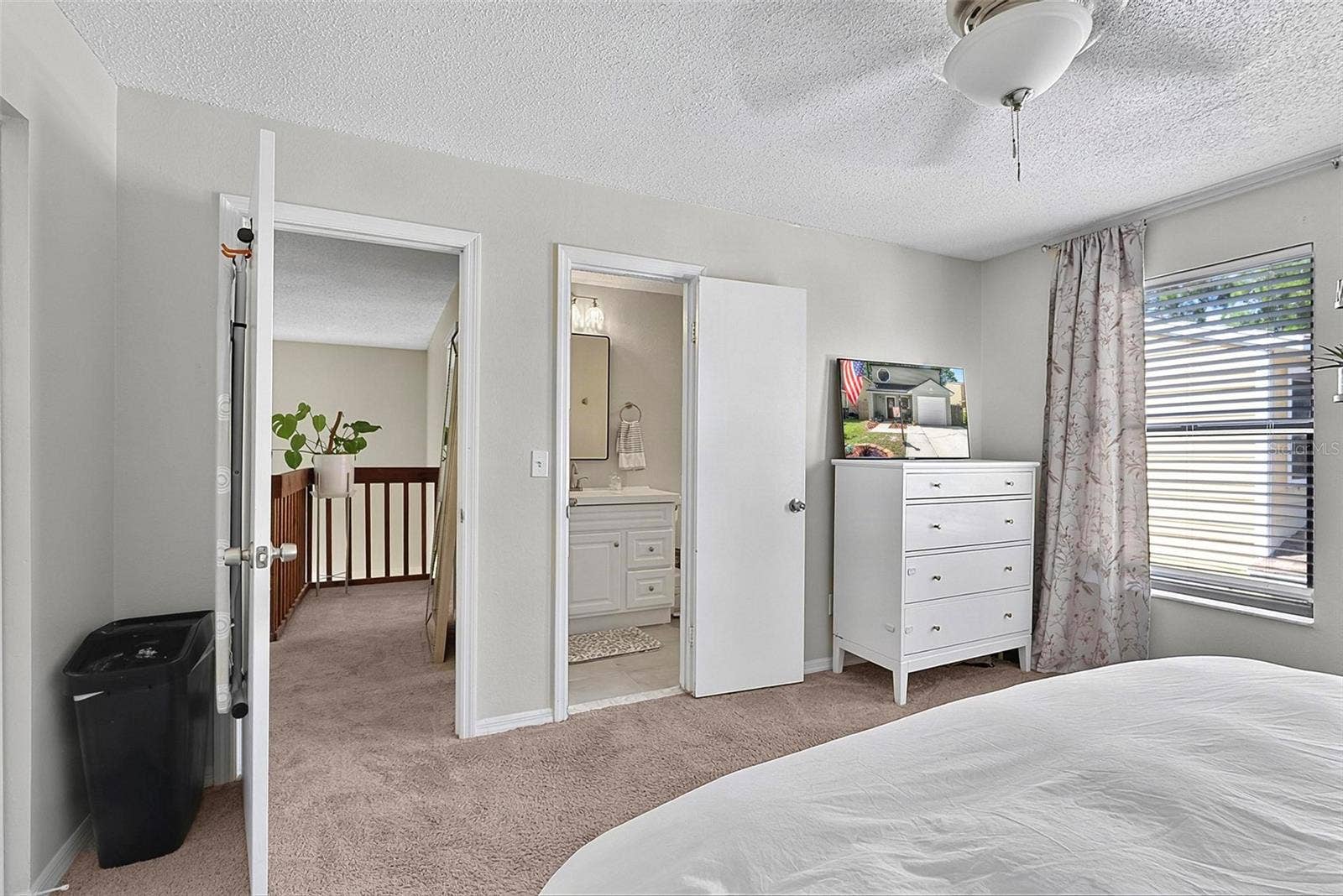 1110 MONTICELLO LANE, #1, Port Orange, FL 32129 Door to hall and primary bathroom