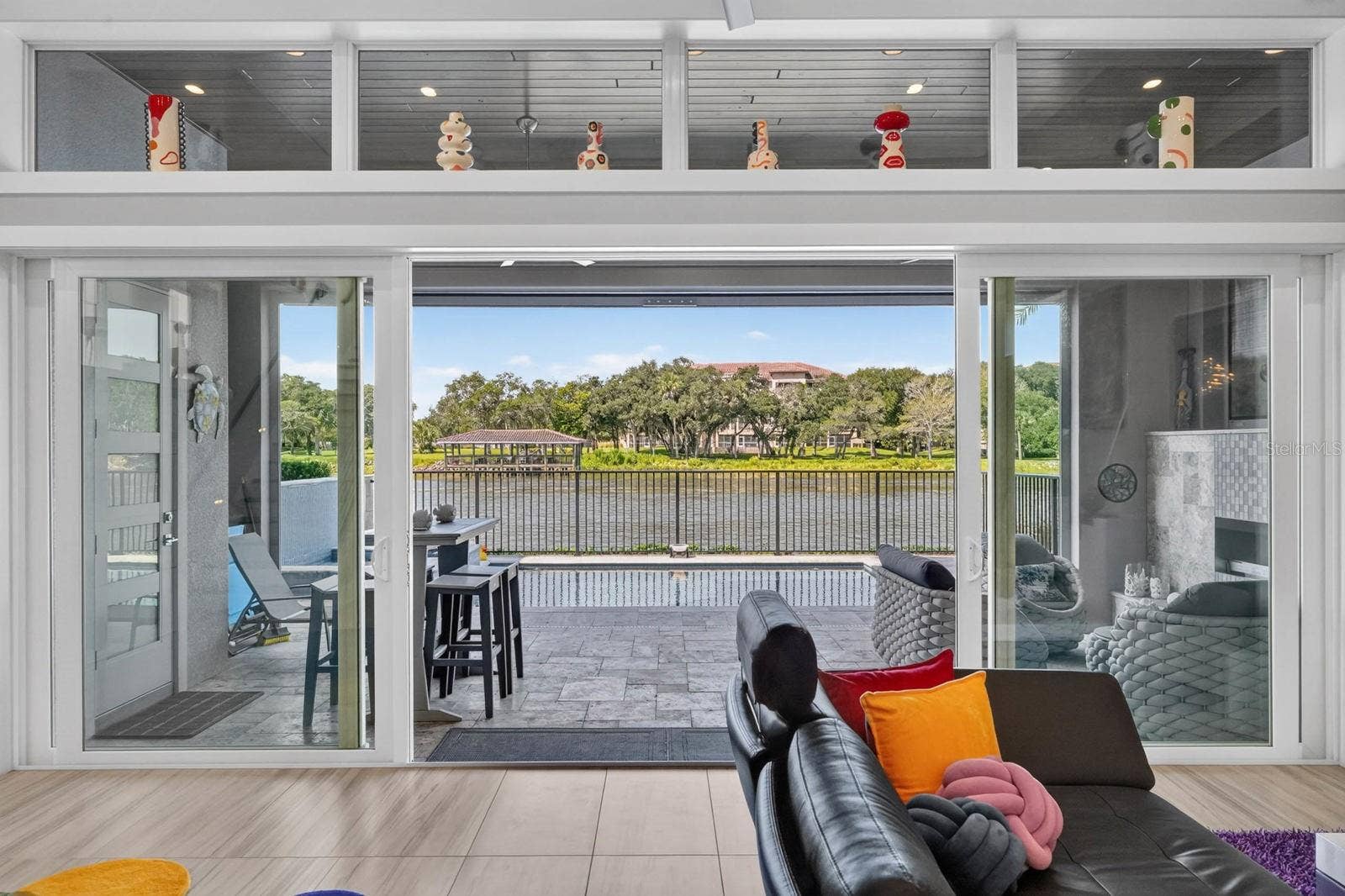 304 YACHT HARBOR DRIVE, Palm Coast, FL 32137 Open the glass doors and indoor-outdoor living becomes onepool, covered lanai and wide water views extending naturally from the main living space.