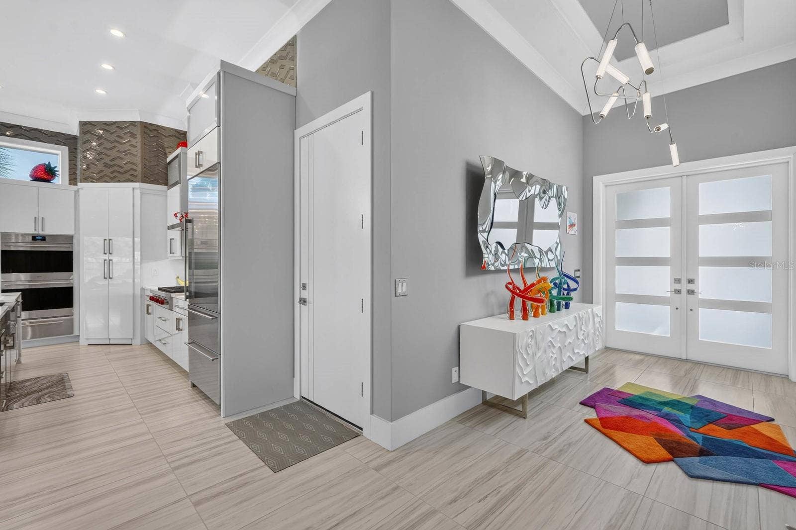 304 YACHT HARBOR DRIVE, Palm Coast, FL 32137 The details start the moment you walk in. Soaring ceilings, smooth-finish walls, designer lighting and custom solid-wood doors set the tone.