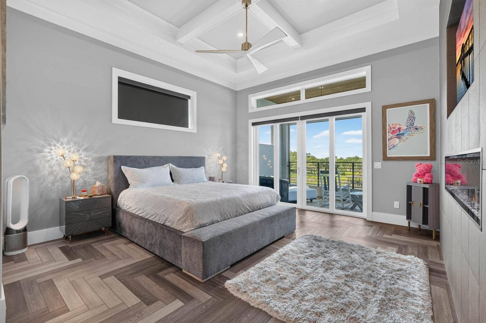 304 YACHT HARBOR DRIVE, Palm Coast, FL 32137 Wake up to the water.A spacious primary suite with architectural ceilings, fireplace and direct access to its own covered balcony.