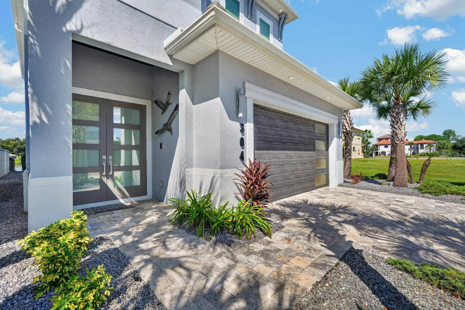 304 YACHT HARBOR DRIVE, Palm Coast, FL 32137 Easy waterfront living. HOA-maintained lawn care and seawall add to the lock-and-leave lifestyle.