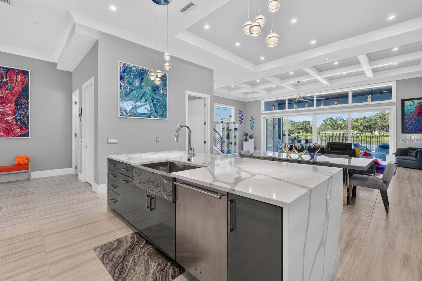 304 YACHT HARBOR DRIVE, Palm Coast, FL 32137 A clean, neutral canvas allowing the art, the water and the personality of the home to do the talking.