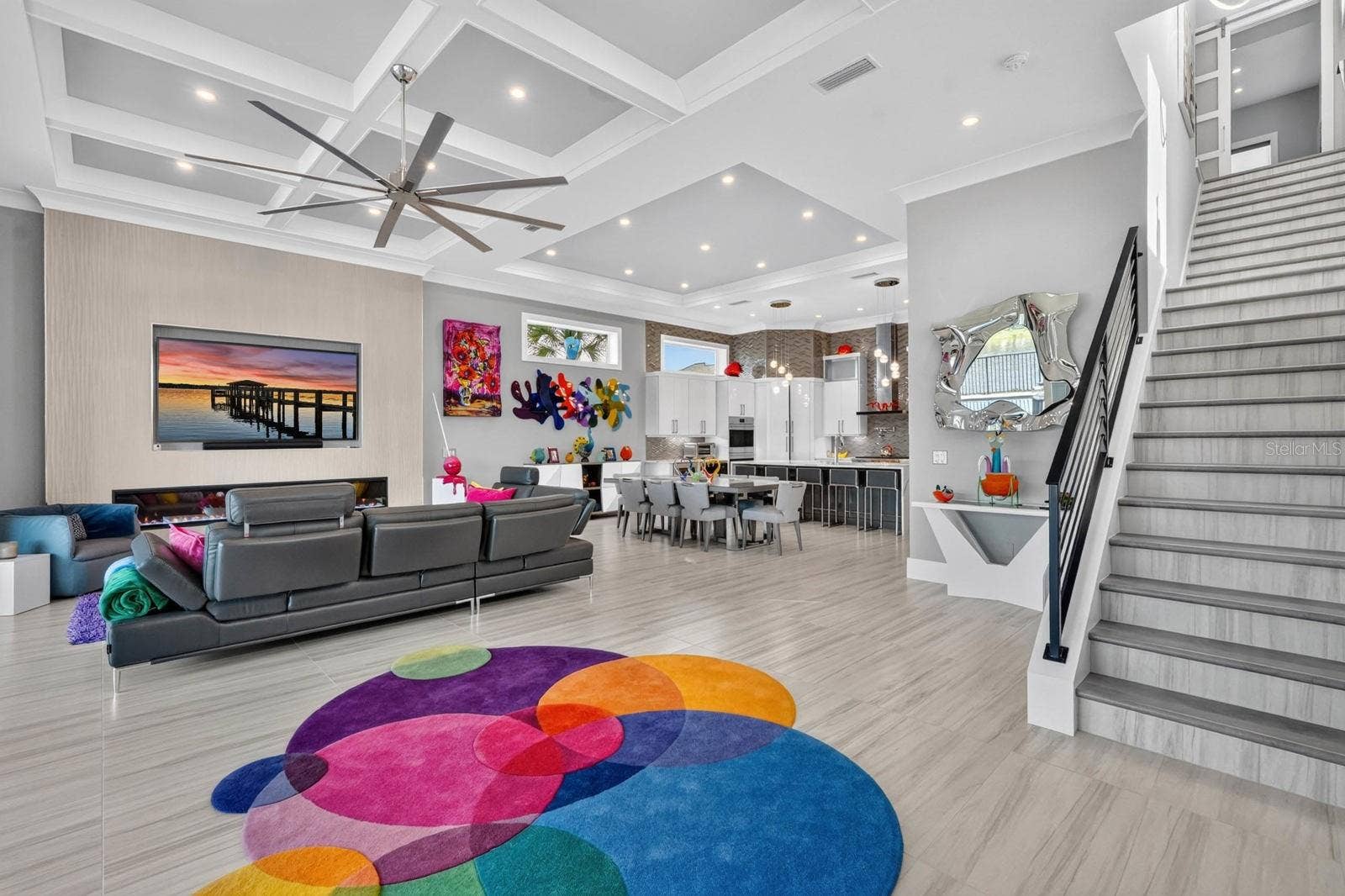 304 YACHT HARBOR DRIVE, Palm Coast, FL 32137 A refreshingly wide first-floor footprint creates an unexpected sense of space, giving the kitchen, dining and living areas room to breathe.