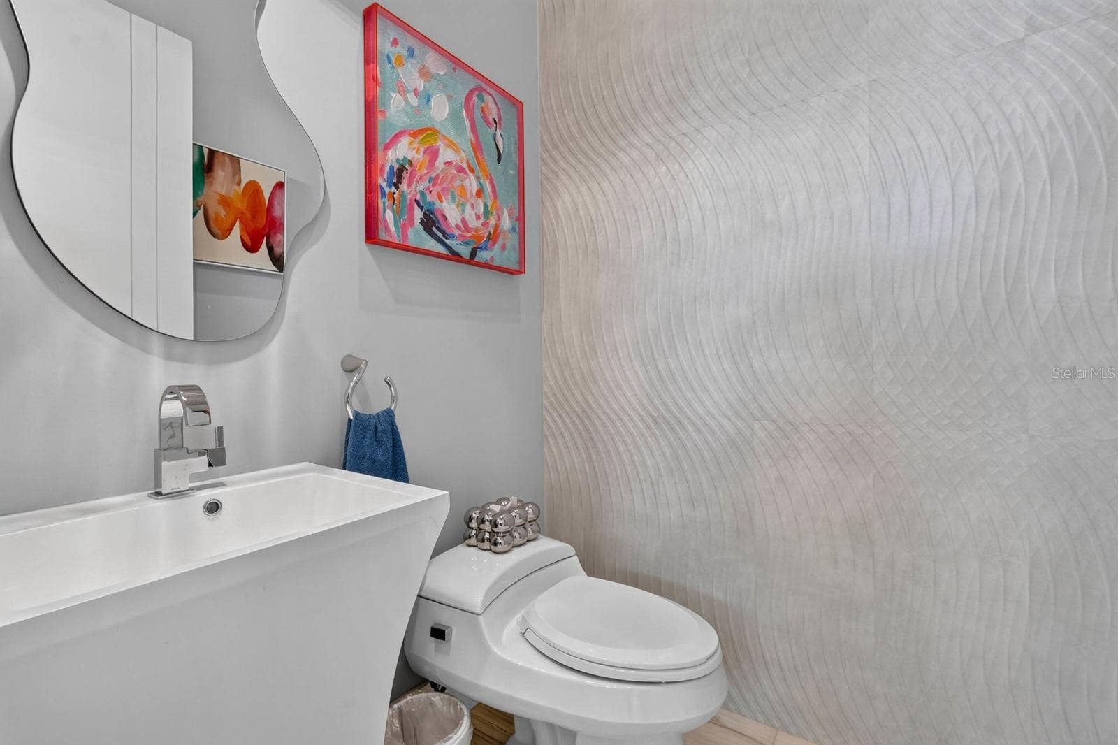 304 YACHT HARBOR DRIVE, Palm Coast, FL 32137 Even the first-floor powder bath makes a statement, with sculptural fixtures, dimensional wall detail.