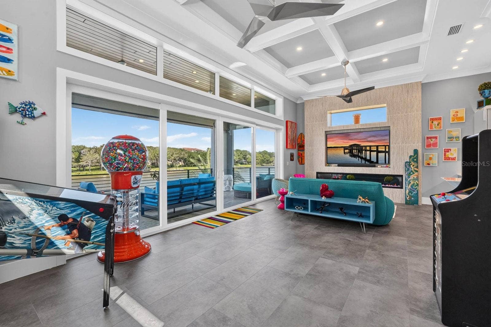 304 YACHT HARBOR DRIVE, Palm Coast, FL 32137 Who says the fun has to stay downstairs? A dedicated second-floor gathering space with fireplace, wet bar, game area and expansive balcony overlooking the Intracoastal.