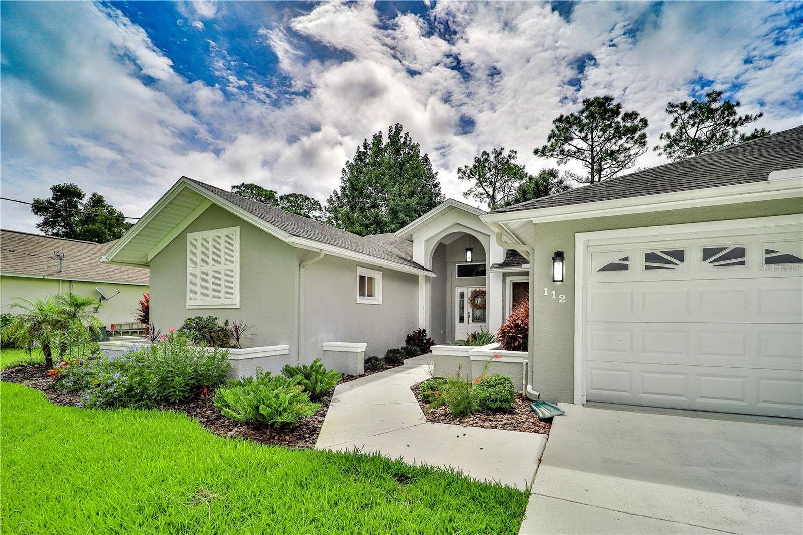 112 WELLSTONE DRIVE, Palm Coast, FL 32164 Side to Front