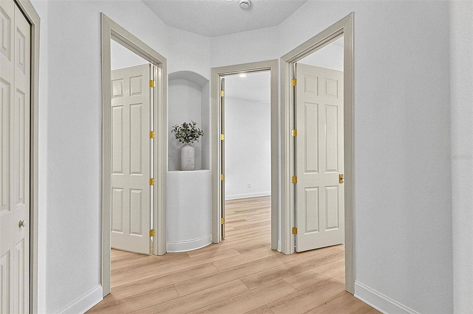 17 GRANDVIEW DRIVE, Palm Coast, FL 32137 Spacious beautiful hallway with built in shelve to guest bedrooms and guest bath